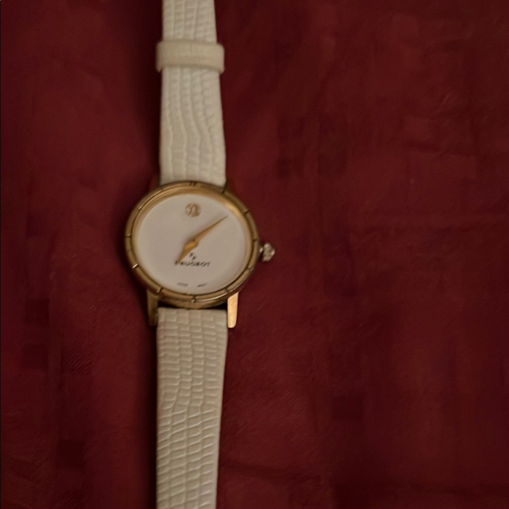 Gold and White Peugeot Wristwatch